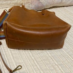 Madewell medium transport tote with strap.